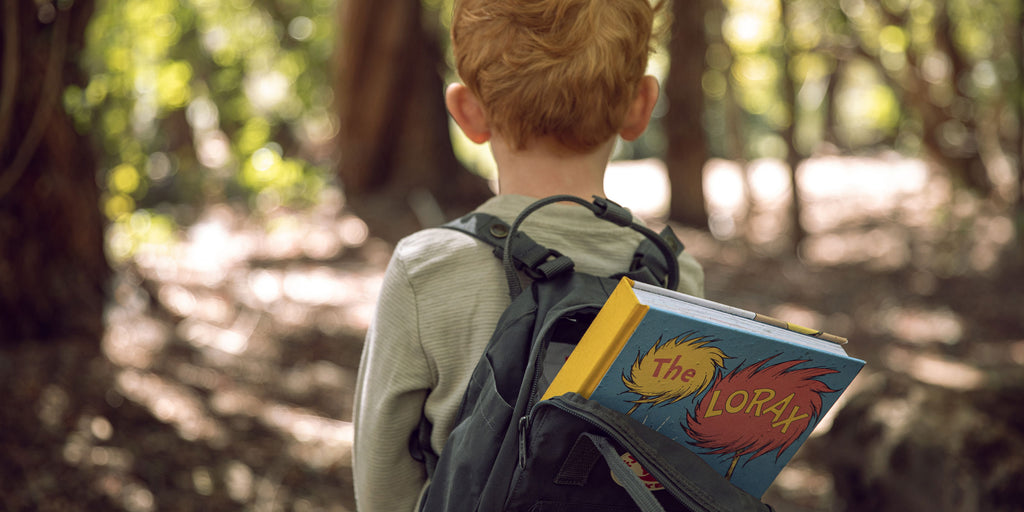 Plantable book in childs backpack